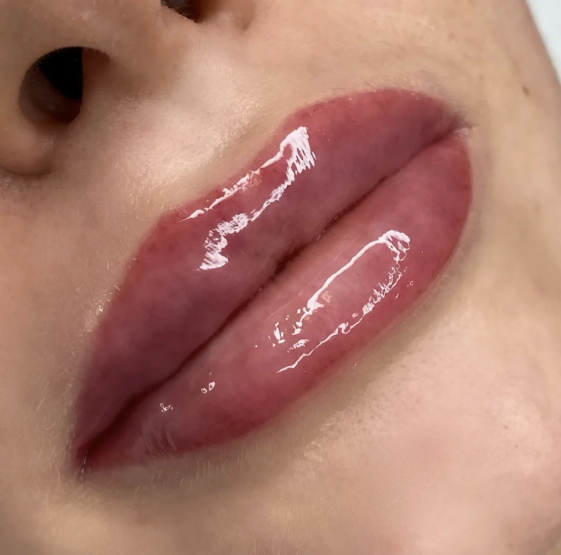 Does a lip tattoo plump your lips?